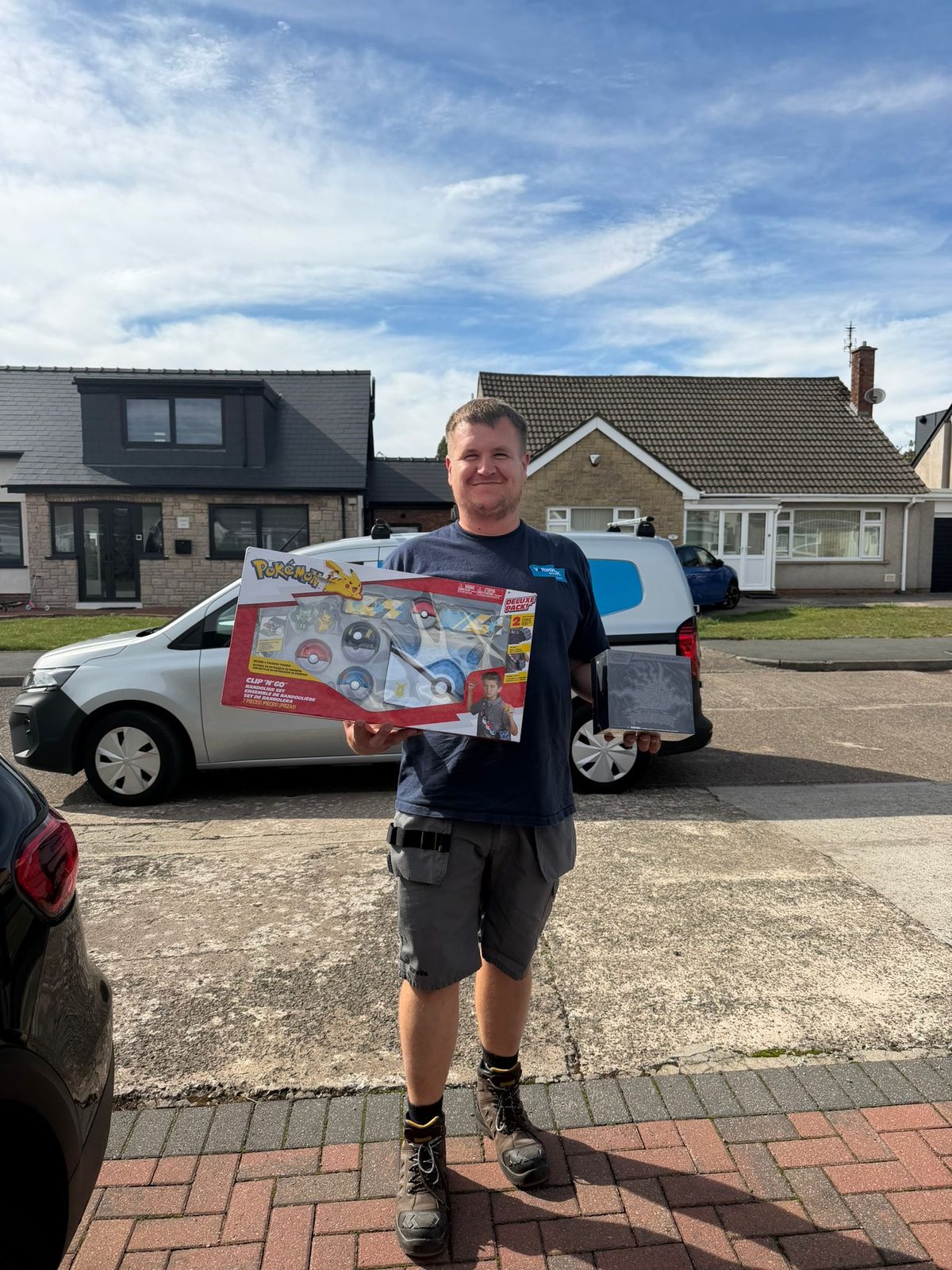 Jon Gimber with their Pokémon Pitch Black Elite Trainer Box + Clip 'N' Go Set prize from Coast Competitions