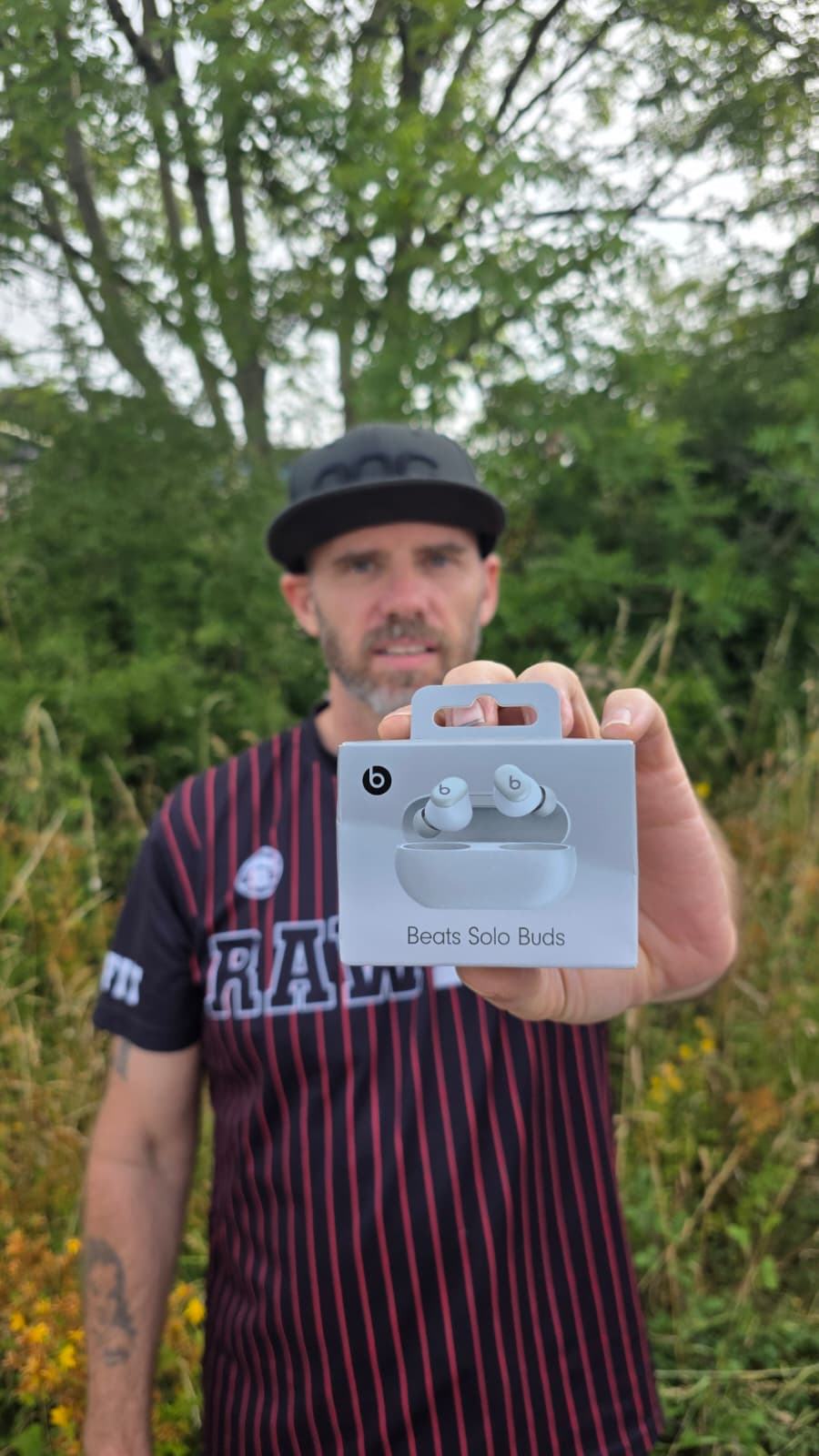Paul Clarke with their Beats Solo Earbuds prize from Coast Competitions